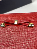 Prada Saffiano Bow Leather Zippy wallet