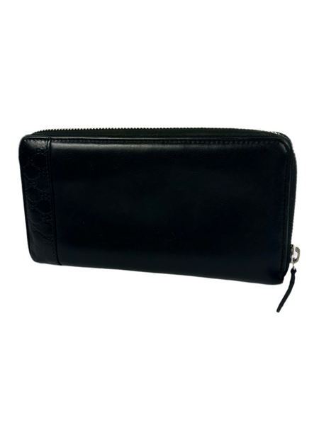 Gucci GG Monogram Leather Zippy Wallet