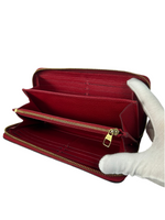Louis Vuitton Monogram Empreinte Leather Zippy Wallet