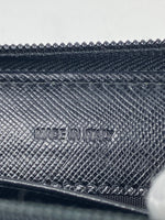 Prada metal nylon zippy wallet