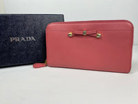 Prada Saffiano Bow leather zippy wallet