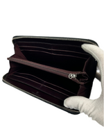 Chanel CC Quilted Leather Zippy Wallet